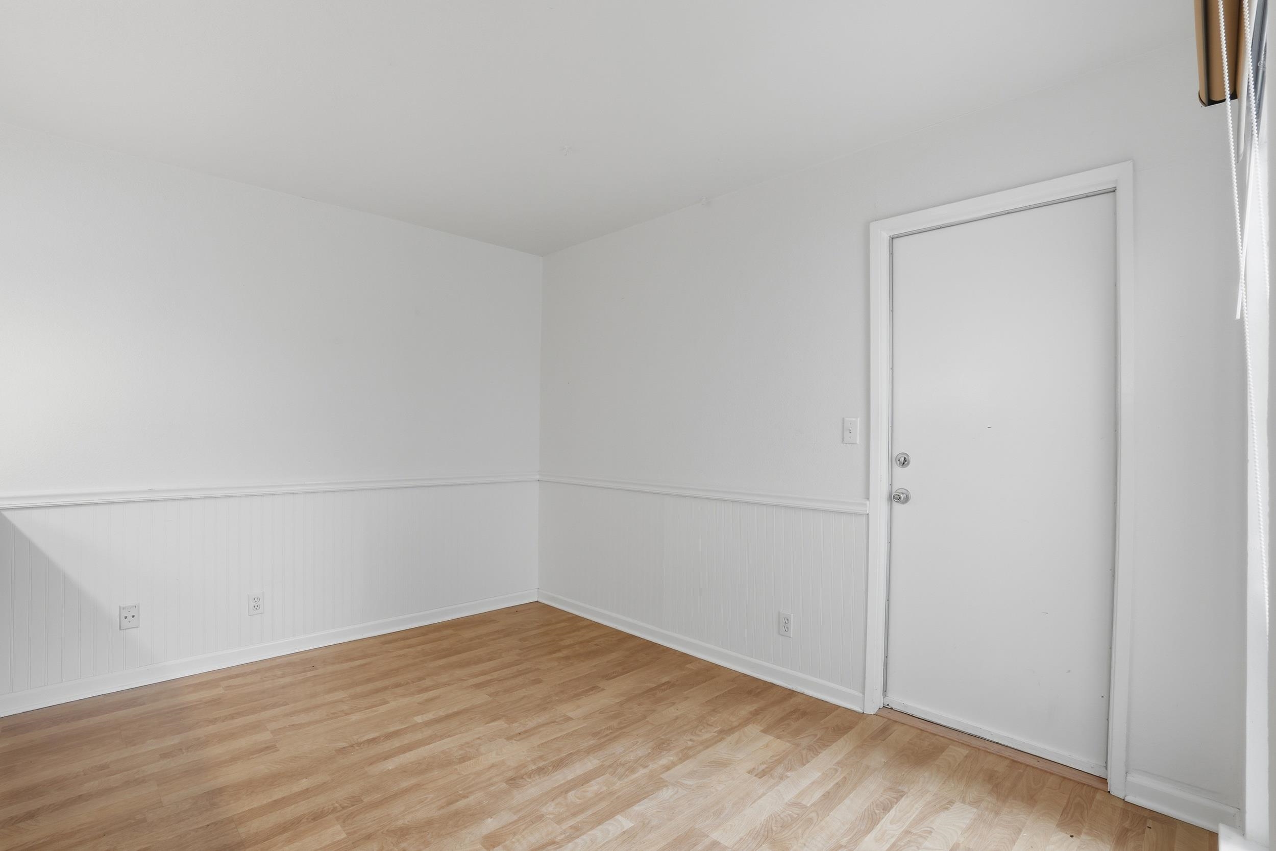3401 Bermuda Avenue, Unit 6 Davis, CA 95616 - Photo 6 of 43 a view of empty room with wooden floor
