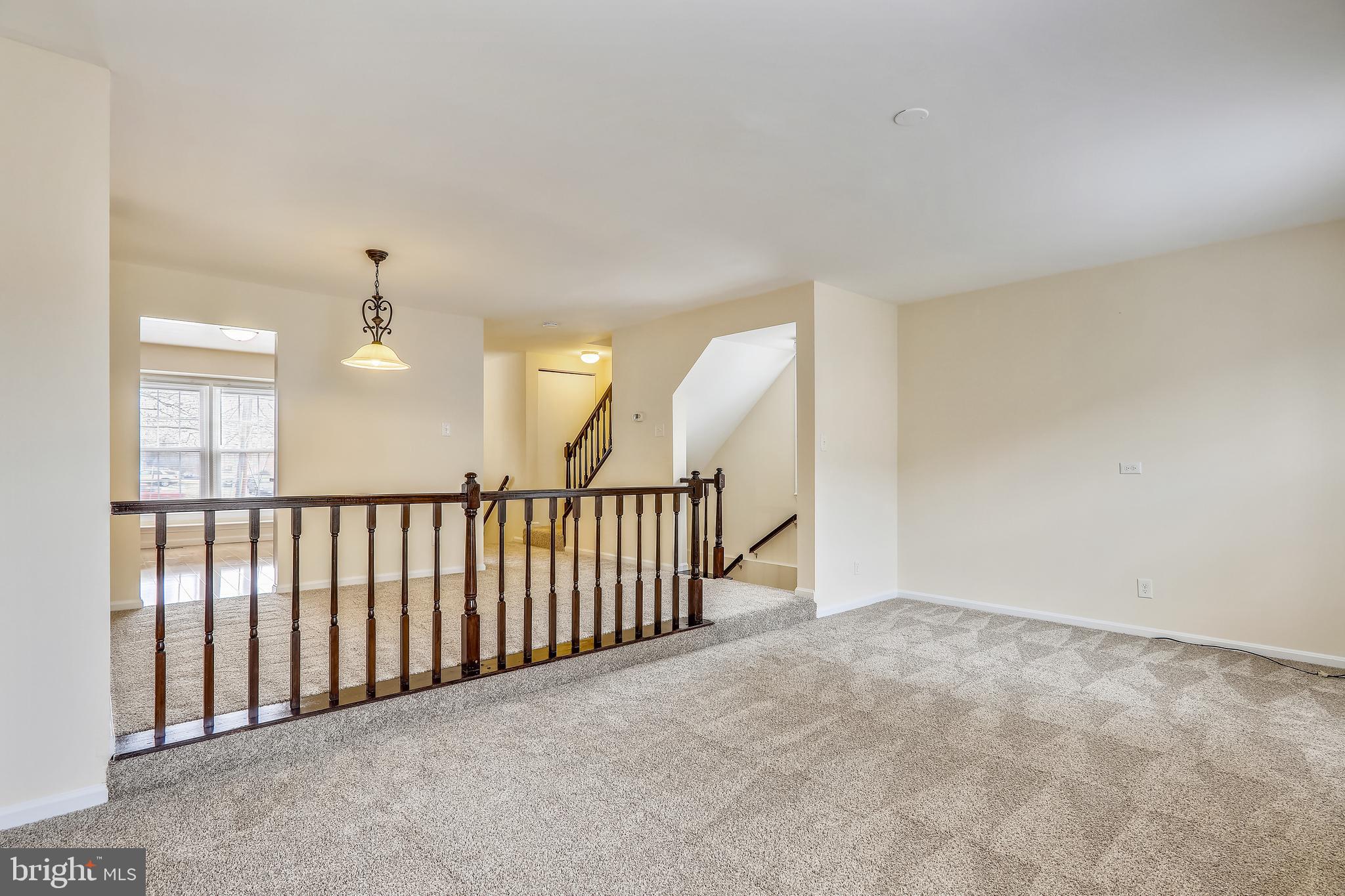 10600 Georgia Avenue Silver Spring, MD 20902 - Photo 12 of 44 Main level step-down living room