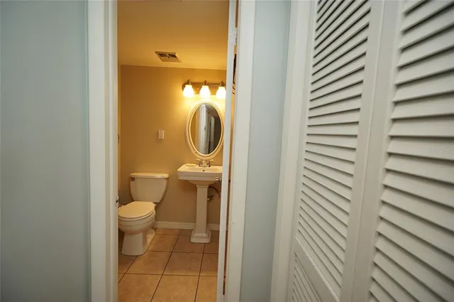 a bathroom with a toilet and a sink