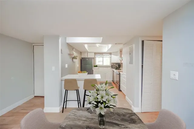 a view of a kitchen with furniture and a rug