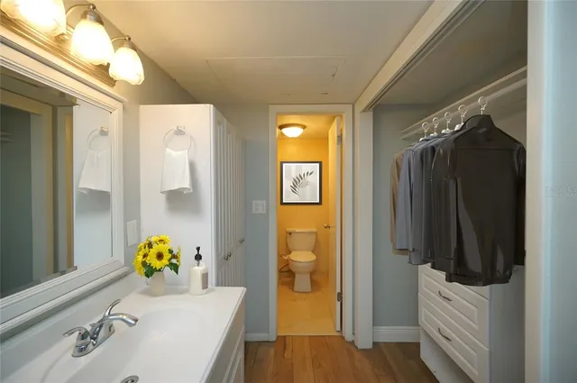 a bathroom with a tub and a sink