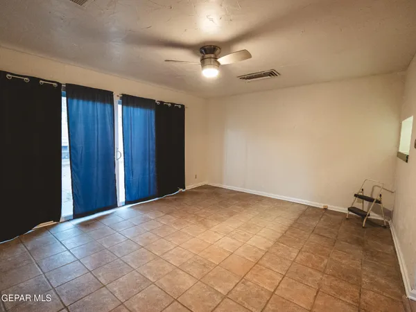 a view of a kitchen cabinets and wooden floor