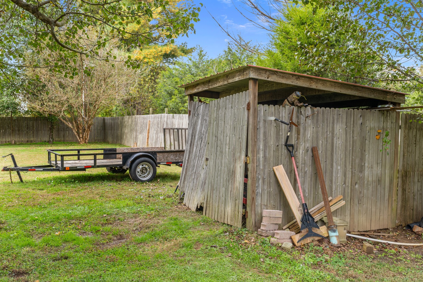 8115 Water Plant Road Baxter, TN 38544 - Photo 34 of 34 a view of a backyard with a slide and swing