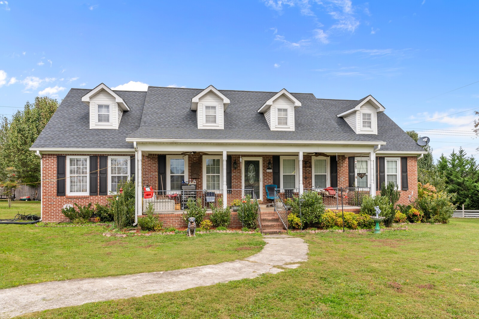 8115 Water Plant Road Baxter, TN 38544 - Photo 7 of 34 a front view of a house with garden