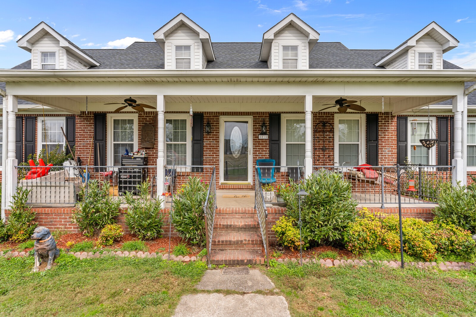 8115 Water Plant Road Baxter, TN 38544 - Photo 8 of 34 front view of a brick house with a yard
