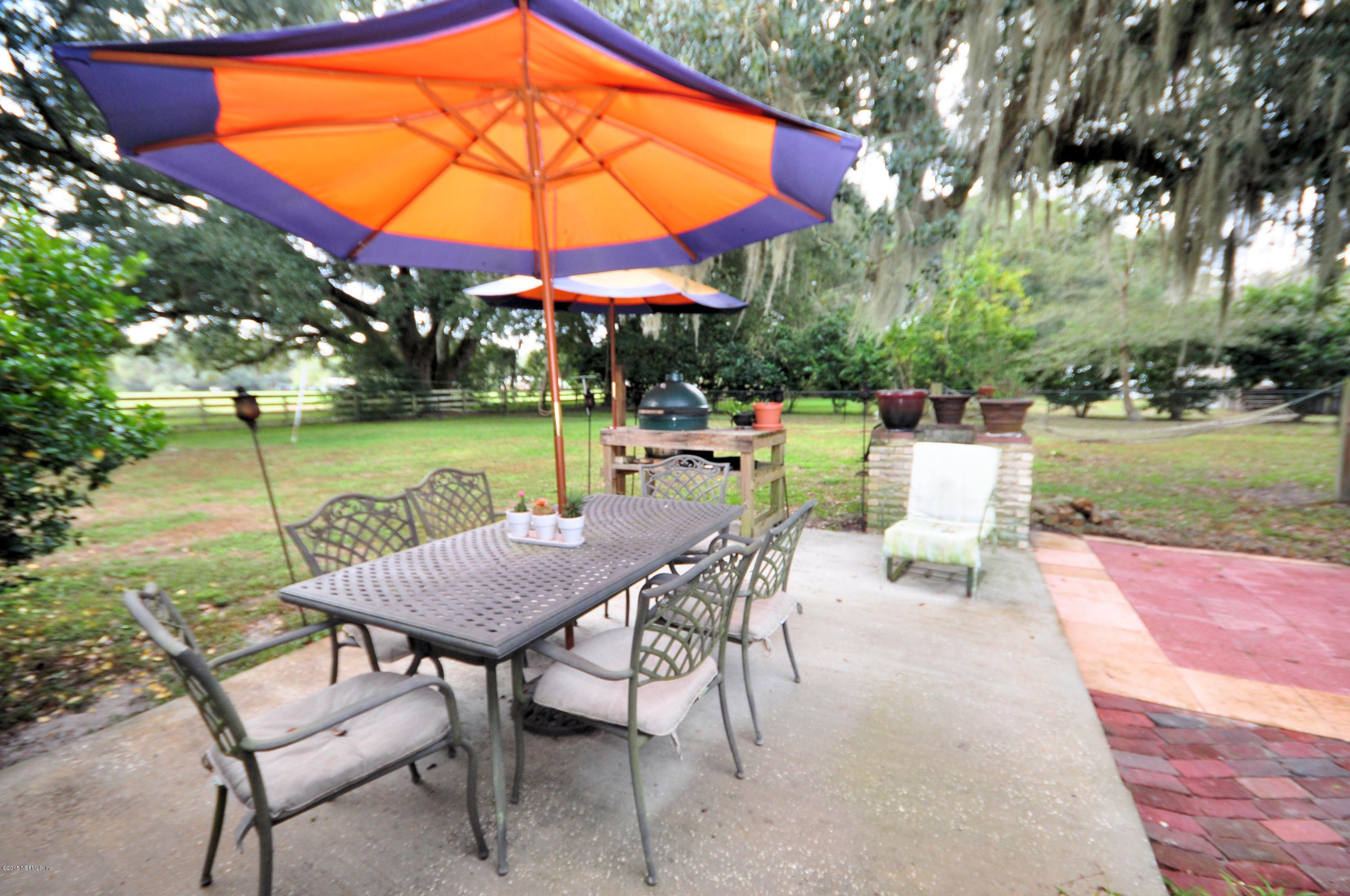 273904 Murrhee Road Hilliard, FL 32046 - Photo 26 of 63 Backyard patio and Grill