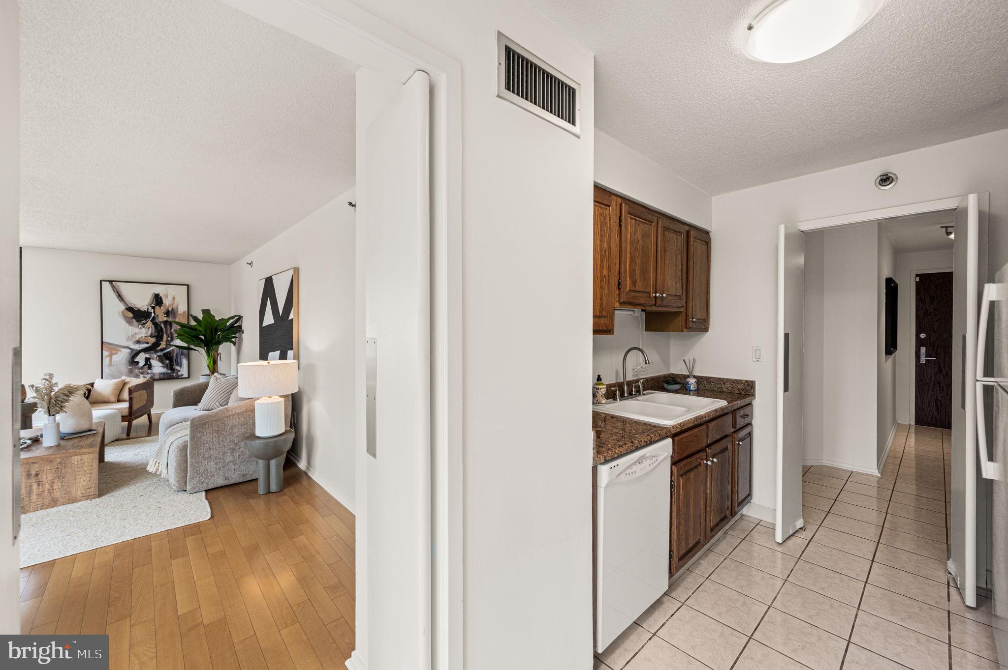 2018 Walnut Street, Unit 5B Philadelphia, PA 19103 - Photo 13 of 43 Kitchen- entrance to living room