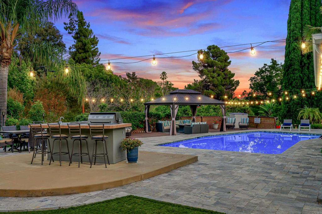 4711 Lorena Place El Cajon, CA 92020 - Photo 2 of 33 a view of a swimming pool with sitting area