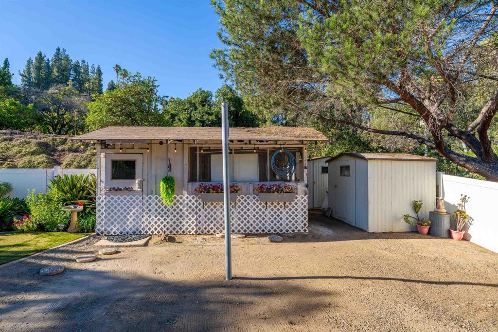 4711 Lorena Place El Cajon, CA 92020 - Photo 30 of 33 a front view of a house with a garden