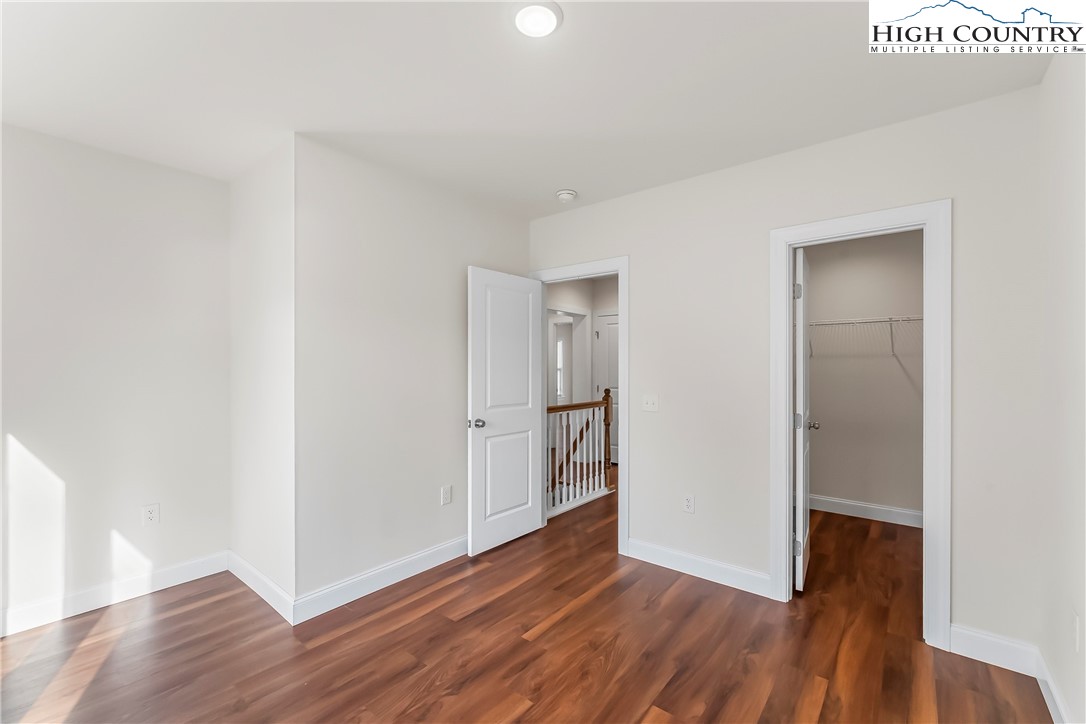 262 Old Bristol Road Boone, NC 28607 - Photo 22 of 38 a view of an empty room with wooden floor
