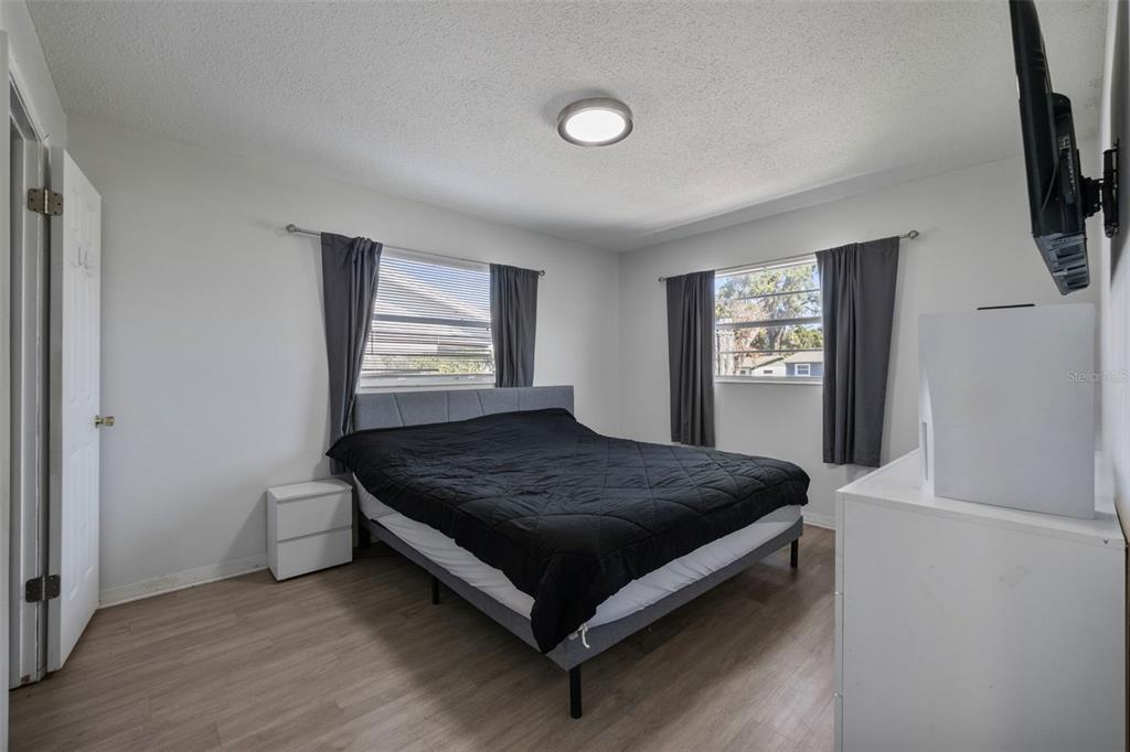 114 Inwood Circle Brandon, FL 33510 - Photo 13 of 31 a bedroom with a bed and window