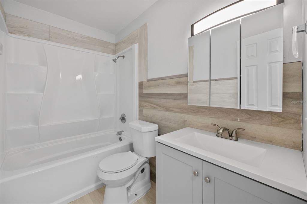 114 Inwood Circle Brandon, FL 33510 - Photo 21 of 31 a bathroom with a sink a toilet and shower