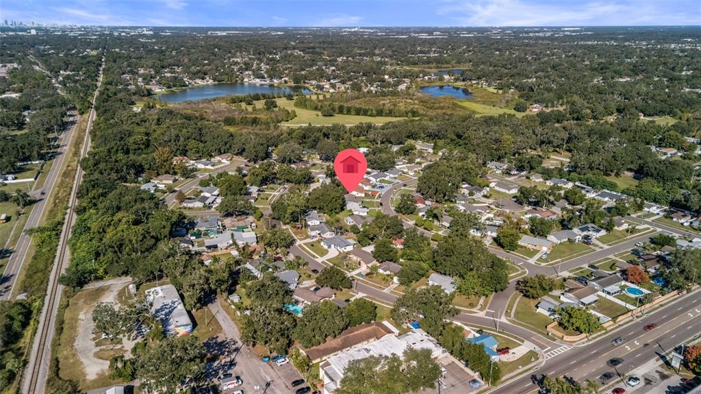 114 Inwood Circle Brandon, FL 33510 - Photo 30 of 31 an aerial view of residential houses with city view and lake view