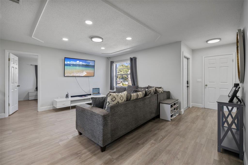 114 Inwood Circle Brandon, FL 33510 - Photo 6 of 31 a living room with furniture and a wooden floor