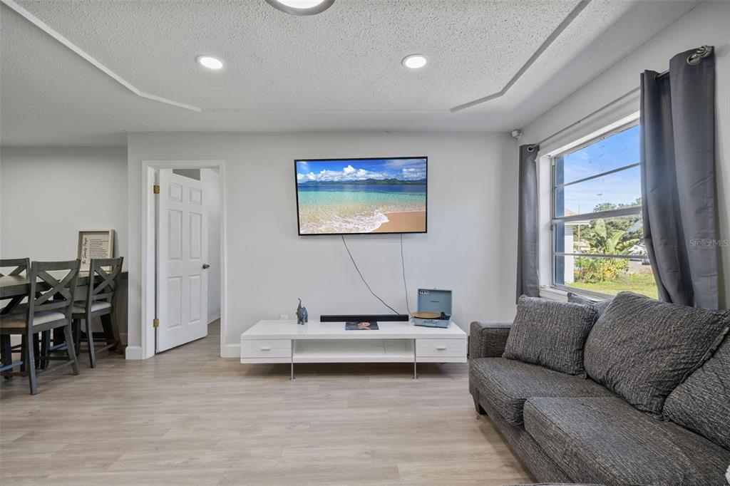 114 Inwood Circle Brandon, FL 33510 - Photo 7 of 31 a living room with furniture and a large window