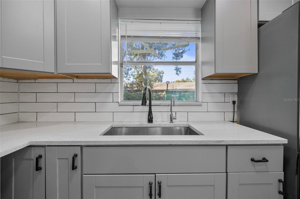 114 Inwood Circle Brandon, FL 33510 - Photo 10 of 31 a kitchen with a sink and cabinets