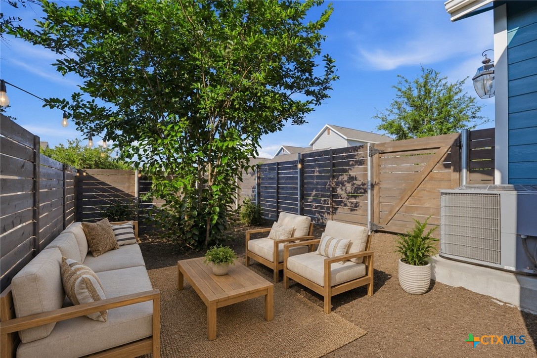 9314 Cattle Baron Path Austin, TX 78747 - Photo 30 of 35 Ai generated photo to show you what you can do with the backyard space.