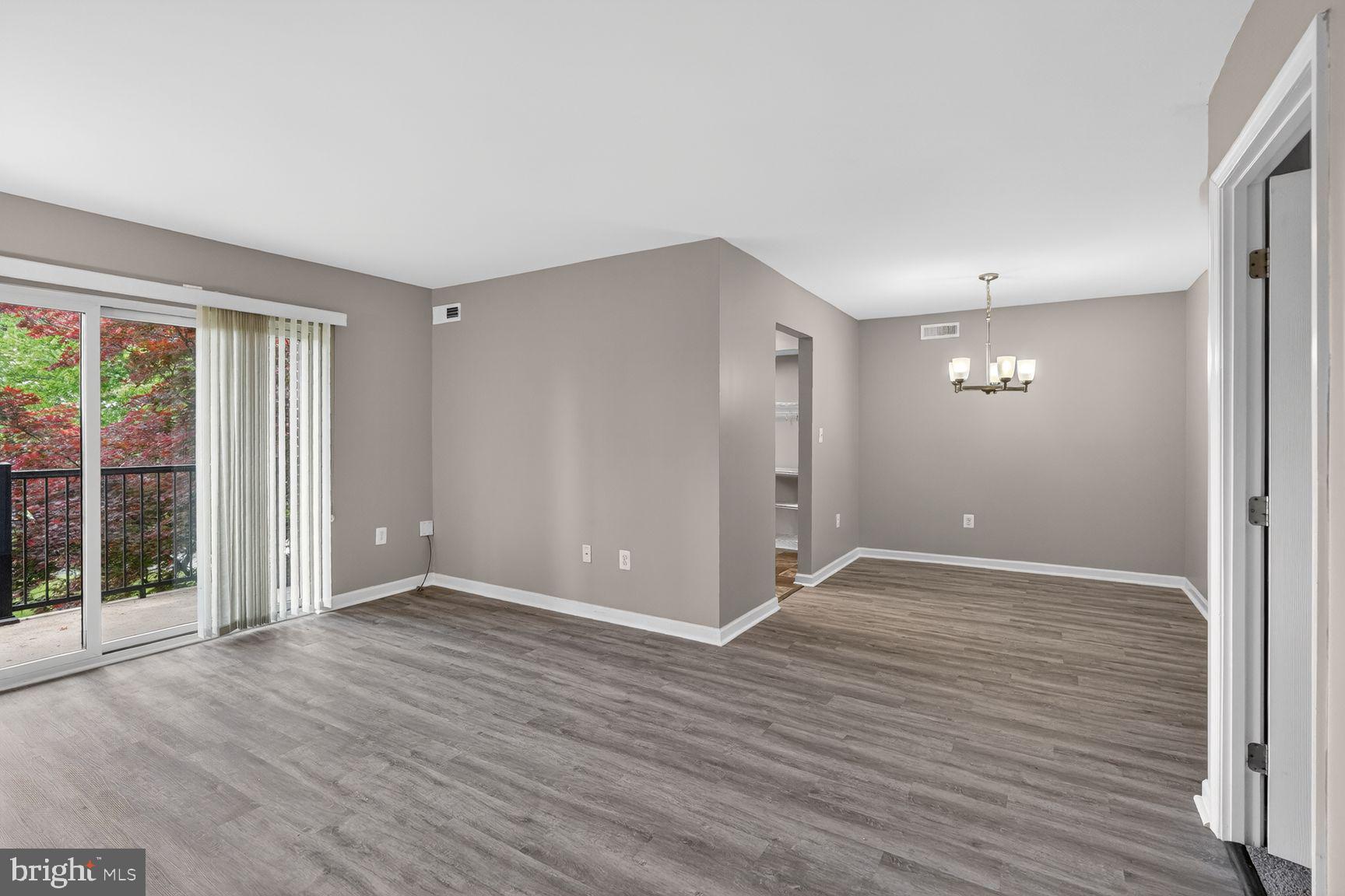 3216 Spartan Road, Unit 40 Olney, MD 20832 - Photo 2 of 25 Spacious, light-filled living area.