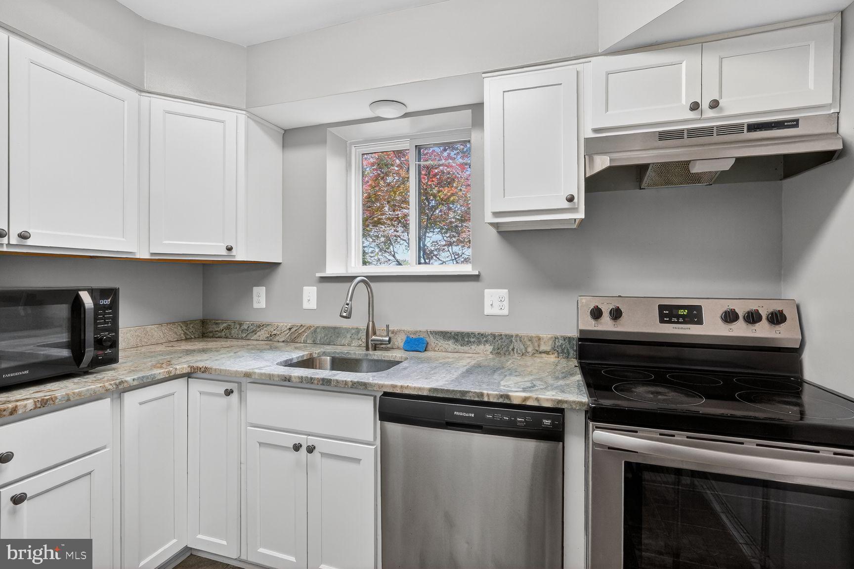 3216 Spartan Road, Unit 40 Olney, MD 20832 - Photo 6 of 25 Modern kitchen with sleek finishes.