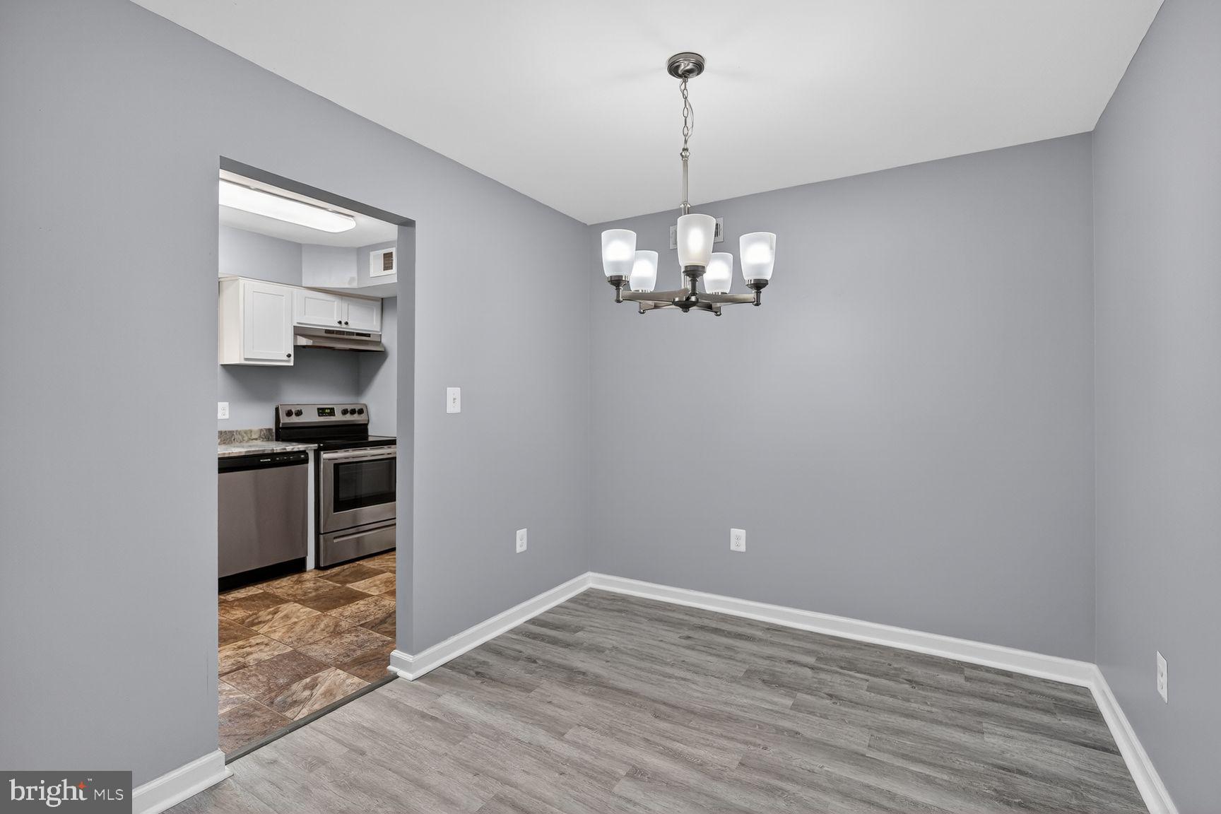 3216 Spartan Road, Unit 40 Olney, MD 20832 - Photo 7 of 25 Modern dining space with sleek design.