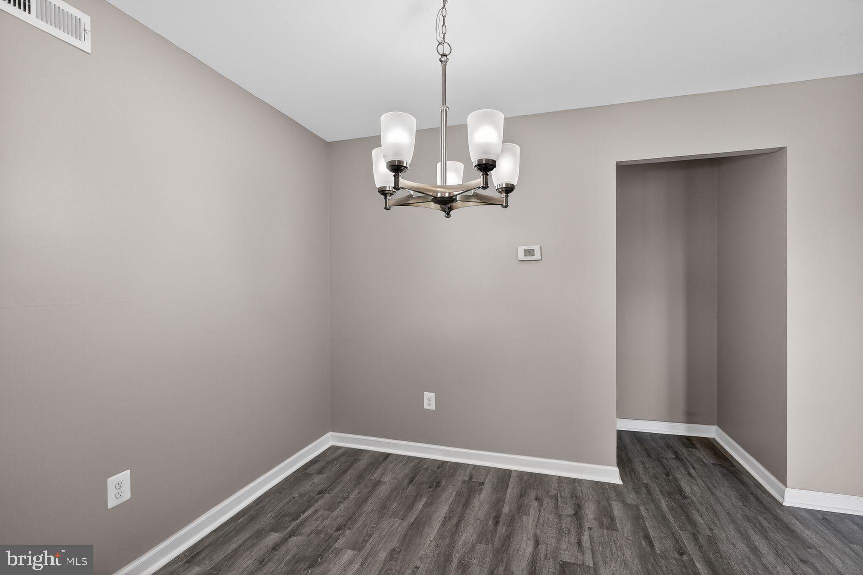 3216 Spartan Road, Unit 40 Olney, MD 20832 - Photo 8 of 25 Elegant dining space with modern charm.