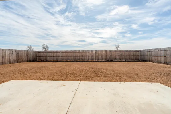 a view of swimming pool with a yard