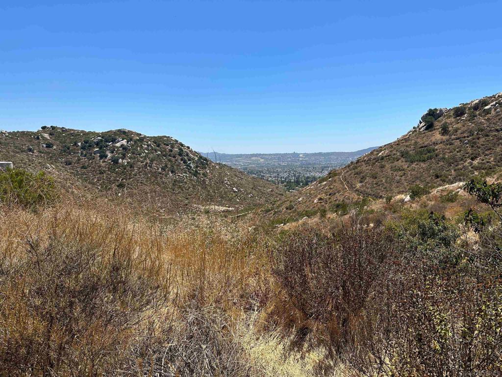 0 Summit Crest Drive Santee, CA 92071 - Photo 4 of 25 a view of a dry yard with mountains in the background