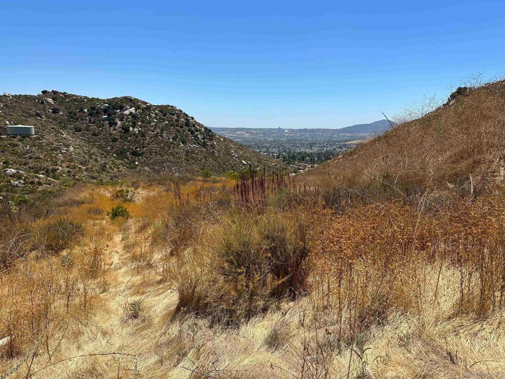 0 Summit Crest Drive Santee, CA 92071 - Photo 10 of 25 a view of a dry yard with mountains in the background