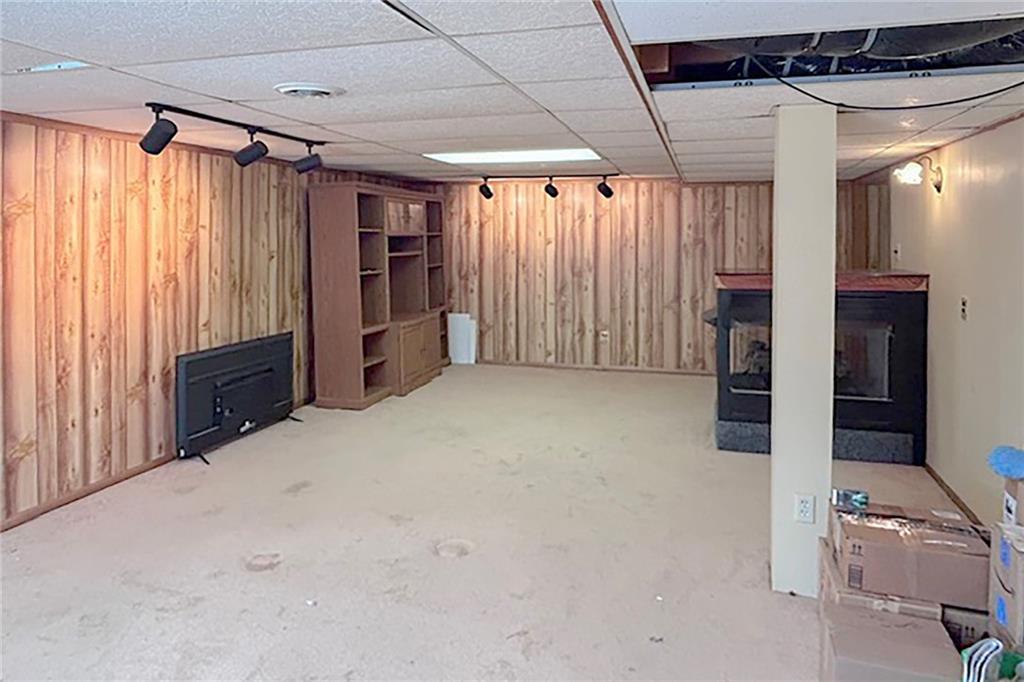 2555 Warren Road Indiana, PA 15701 - Photo 26 of 42 Family room on lower level with 3-sided gas, ventless fireplace