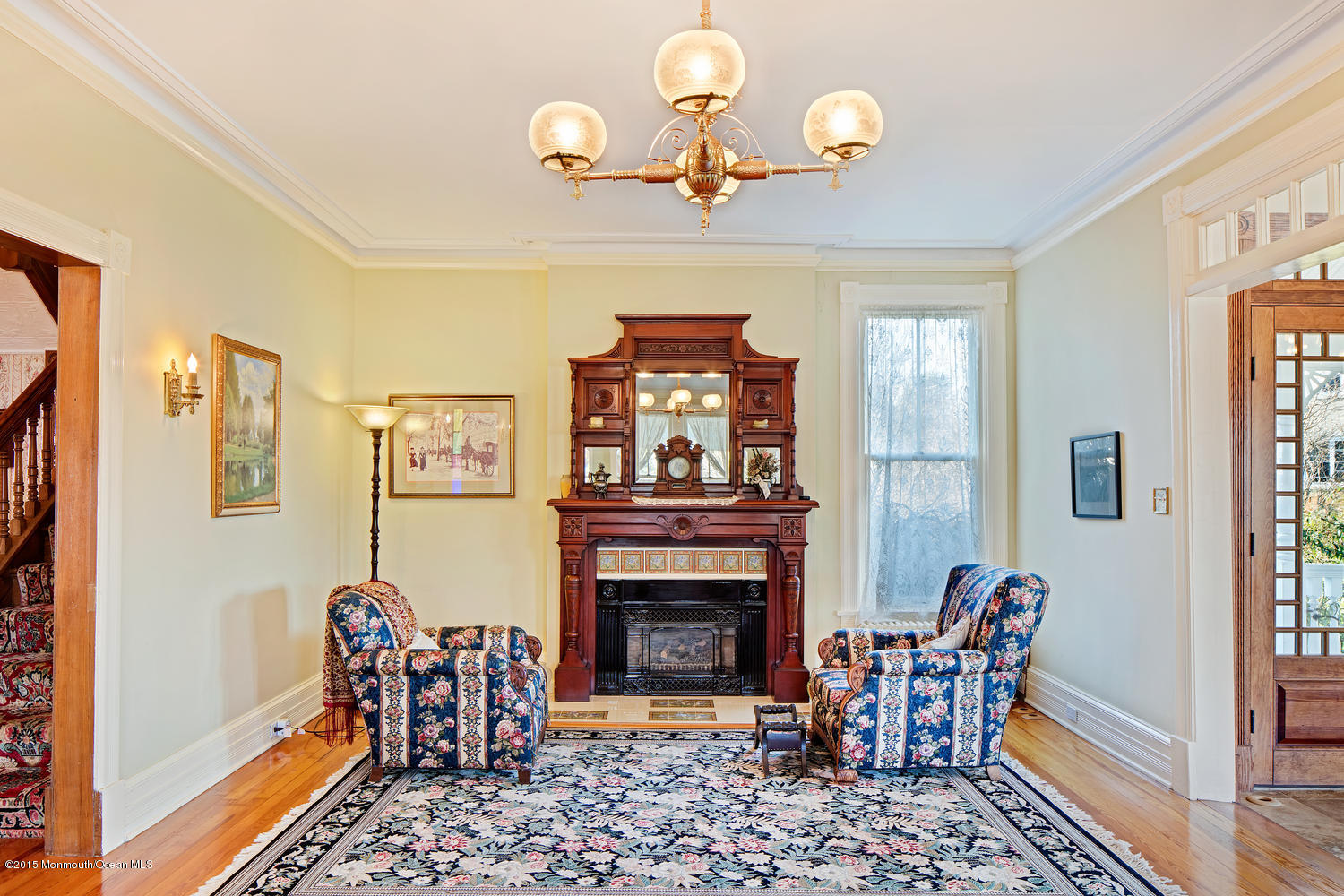 203 East Lake Avenue Spring Lake, NJ 07762 - Photo 11 of 55 a view of a livingroom with furniture and a fireplace