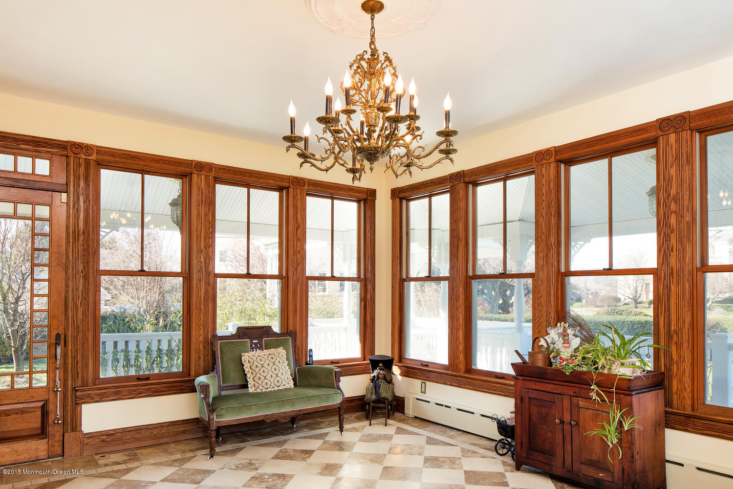 203 East Lake Avenue Spring Lake, NJ 07762 - Photo 14 of 55 a living room with furniture and floor to ceiling windows
