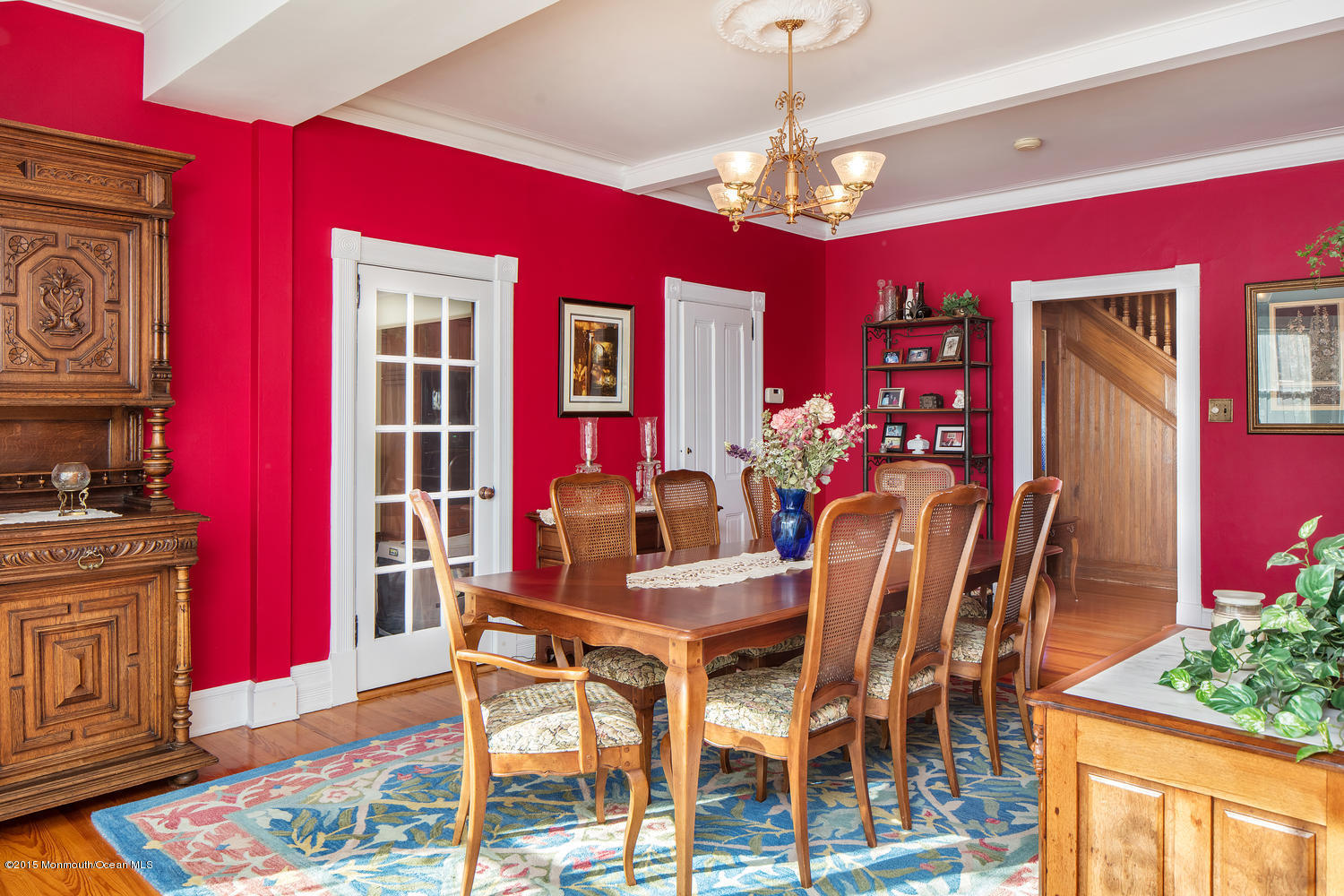 203 East Lake Avenue Spring Lake, NJ 07762 - Photo 16 of 55 a view of a dining room with furniture and chandelier
