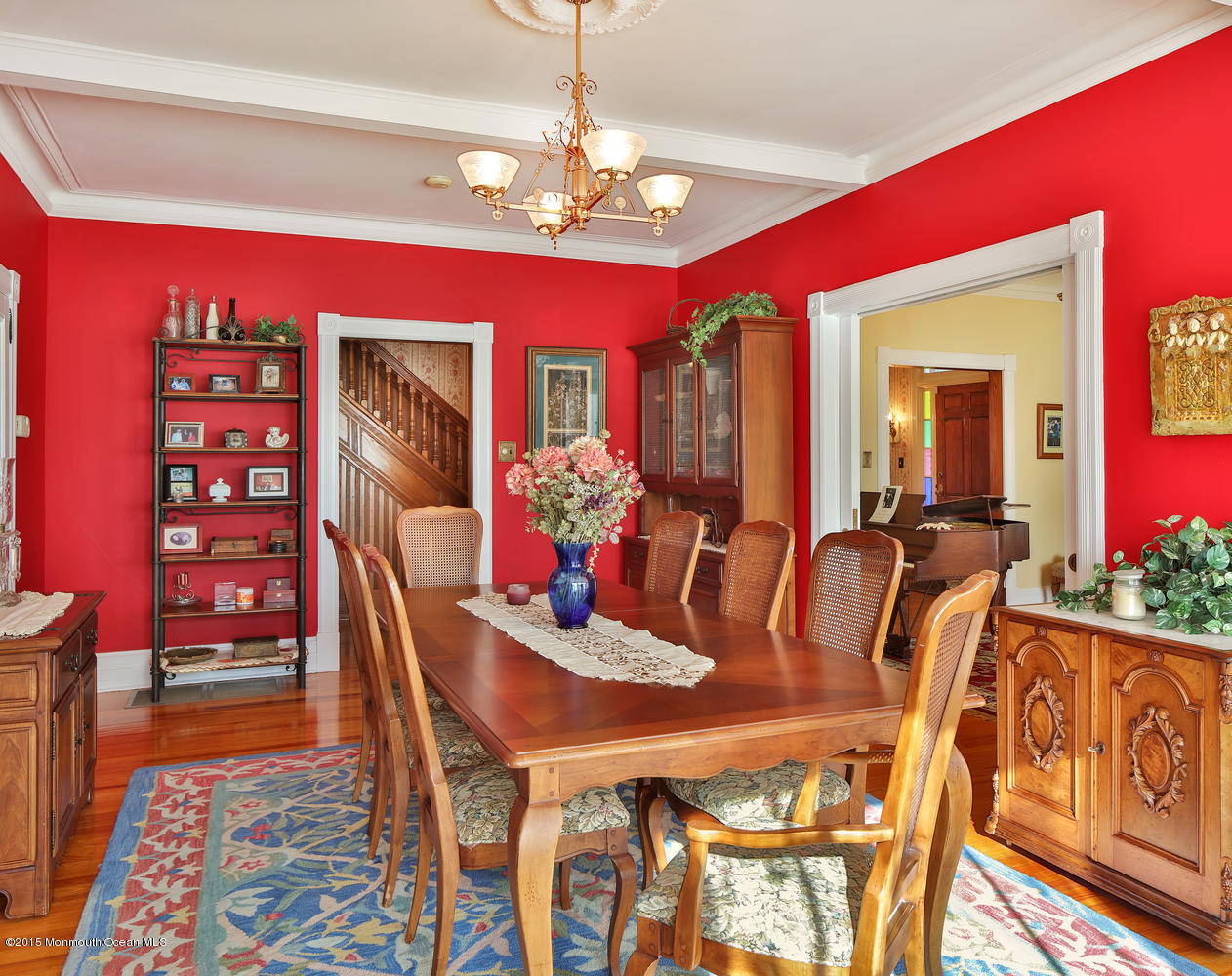 203 East Lake Avenue Spring Lake, NJ 07762 - Photo 17 of 55 a view of a dining room with furniture and chandelier