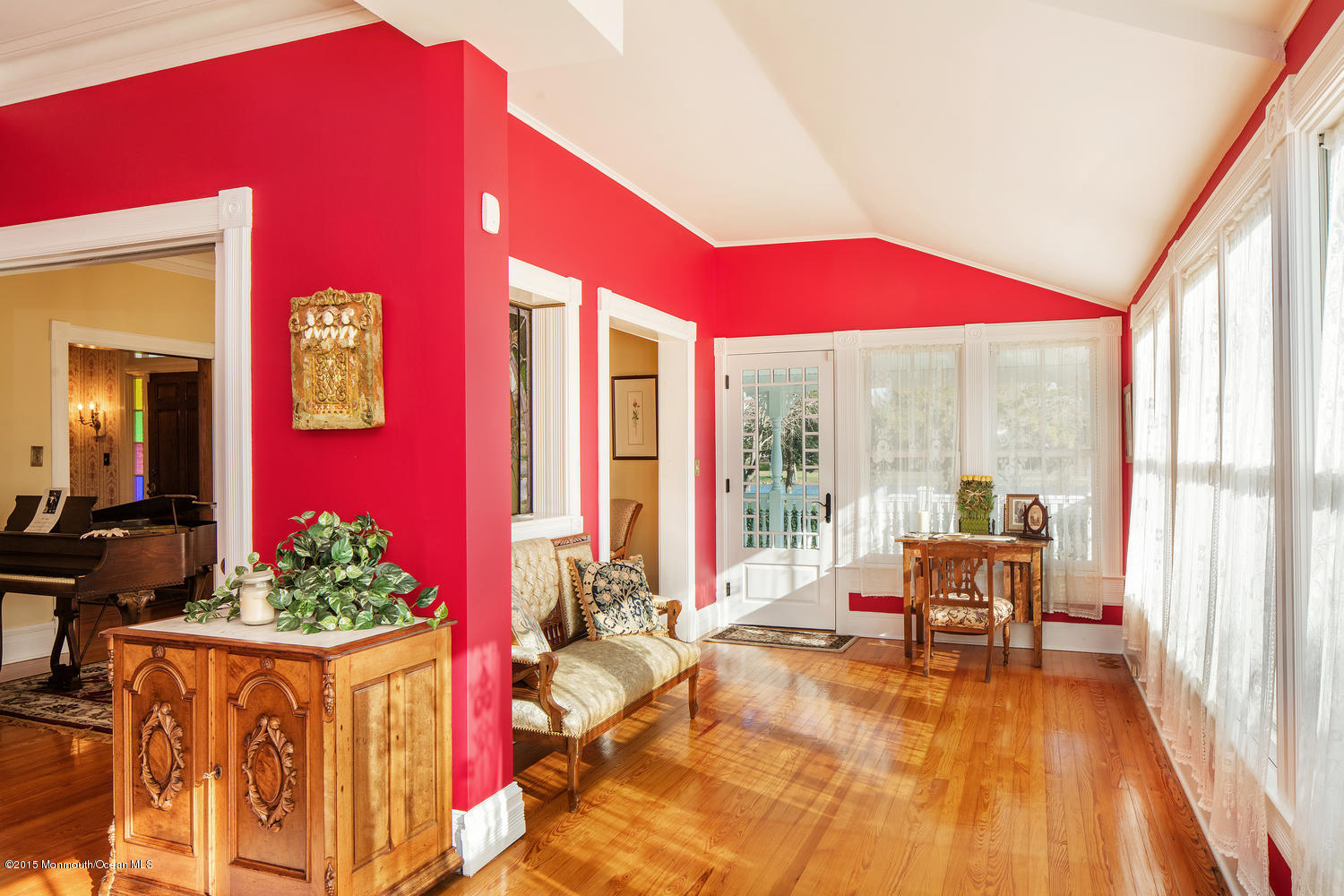 203 East Lake Avenue Spring Lake, NJ 07762 - Photo 18 of 55 a living room with furniture and floor to ceiling windows