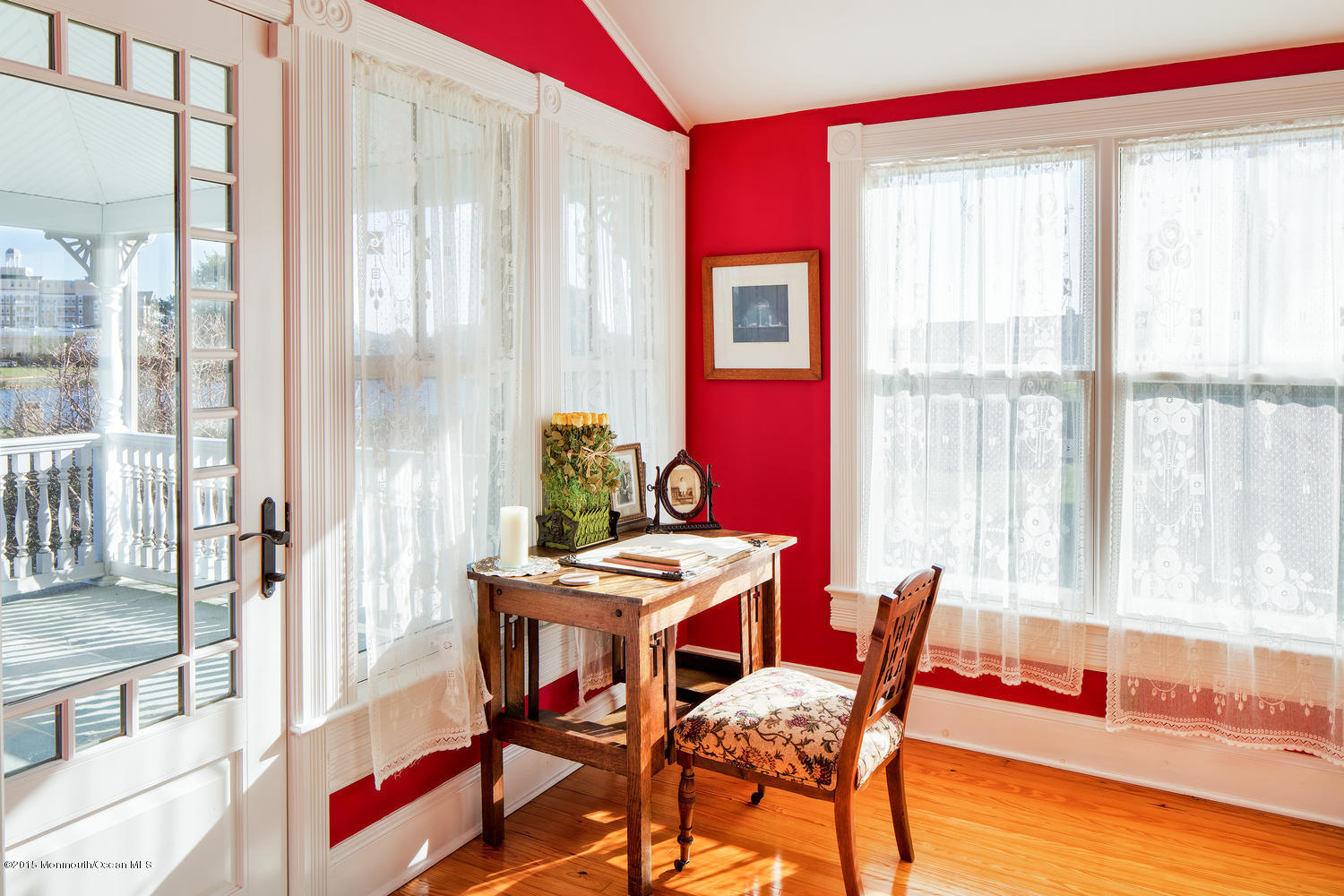 203 East Lake Avenue Spring Lake, NJ 07762 - Photo 19 of 55 a dining room with furniture and wooden floor
