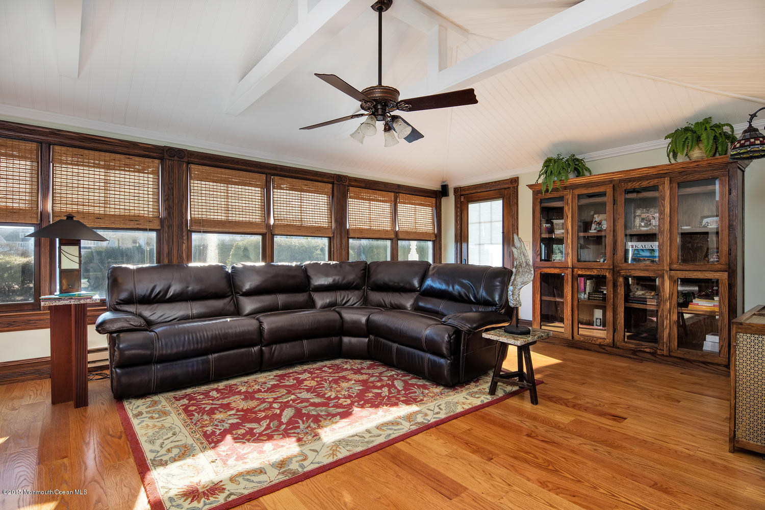 203 East Lake Avenue Spring Lake, NJ 07762 - Photo 20 of 55 a living room with furniture a rug and a window