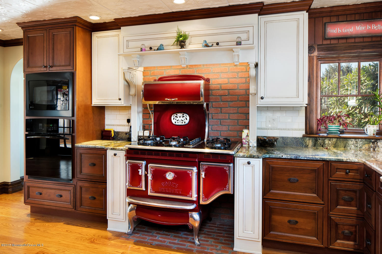 203 East Lake Avenue Spring Lake, NJ 07762 - Photo 24 of 55 a kitchen with stainless steel appliances granite countertop a stove and a refrigerator