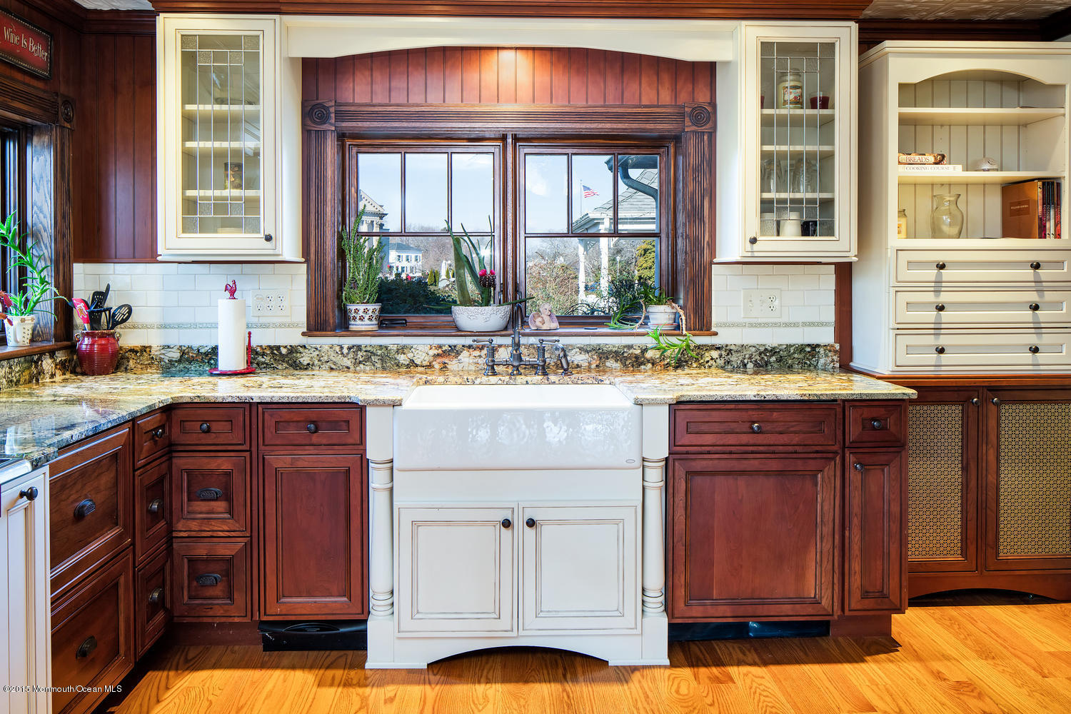 203 East Lake Avenue Spring Lake, NJ 07762 - Photo 26 of 55 a kitchen with stainless steel appliances granite countertop a stove and cabinets