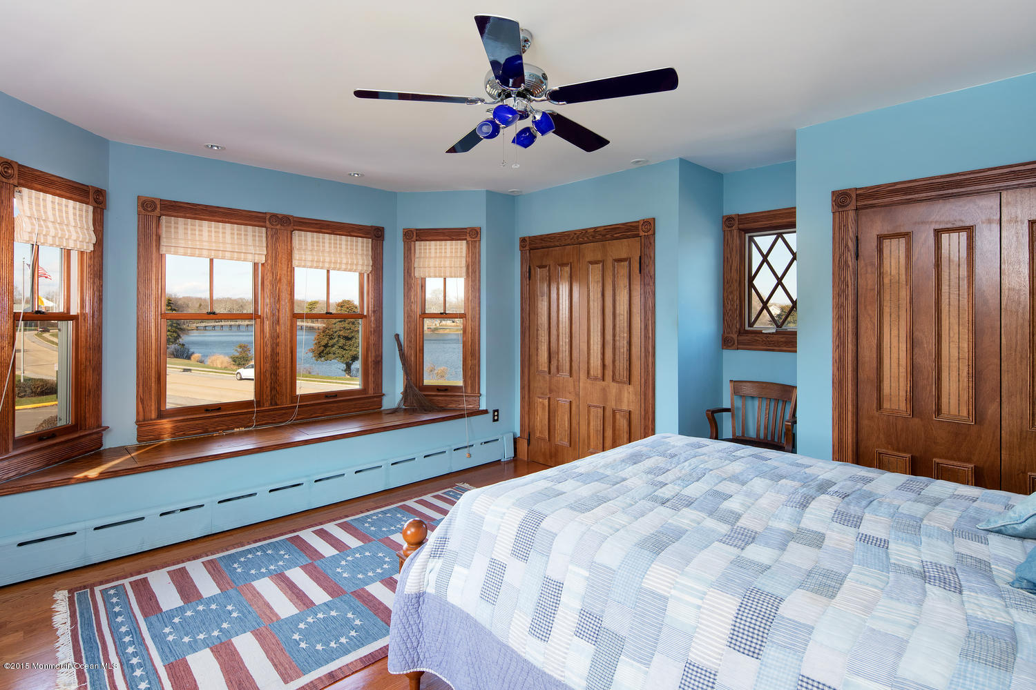 203 East Lake Avenue Spring Lake, NJ 07762 - Photo 34 of 55 a bedroom with a bed and a large window