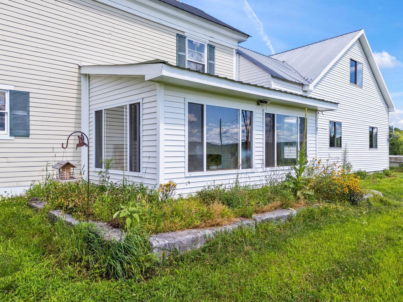 107 Dearborn Road Canton, ME 04221 - Photo 43 of 54 ext view of sunroom