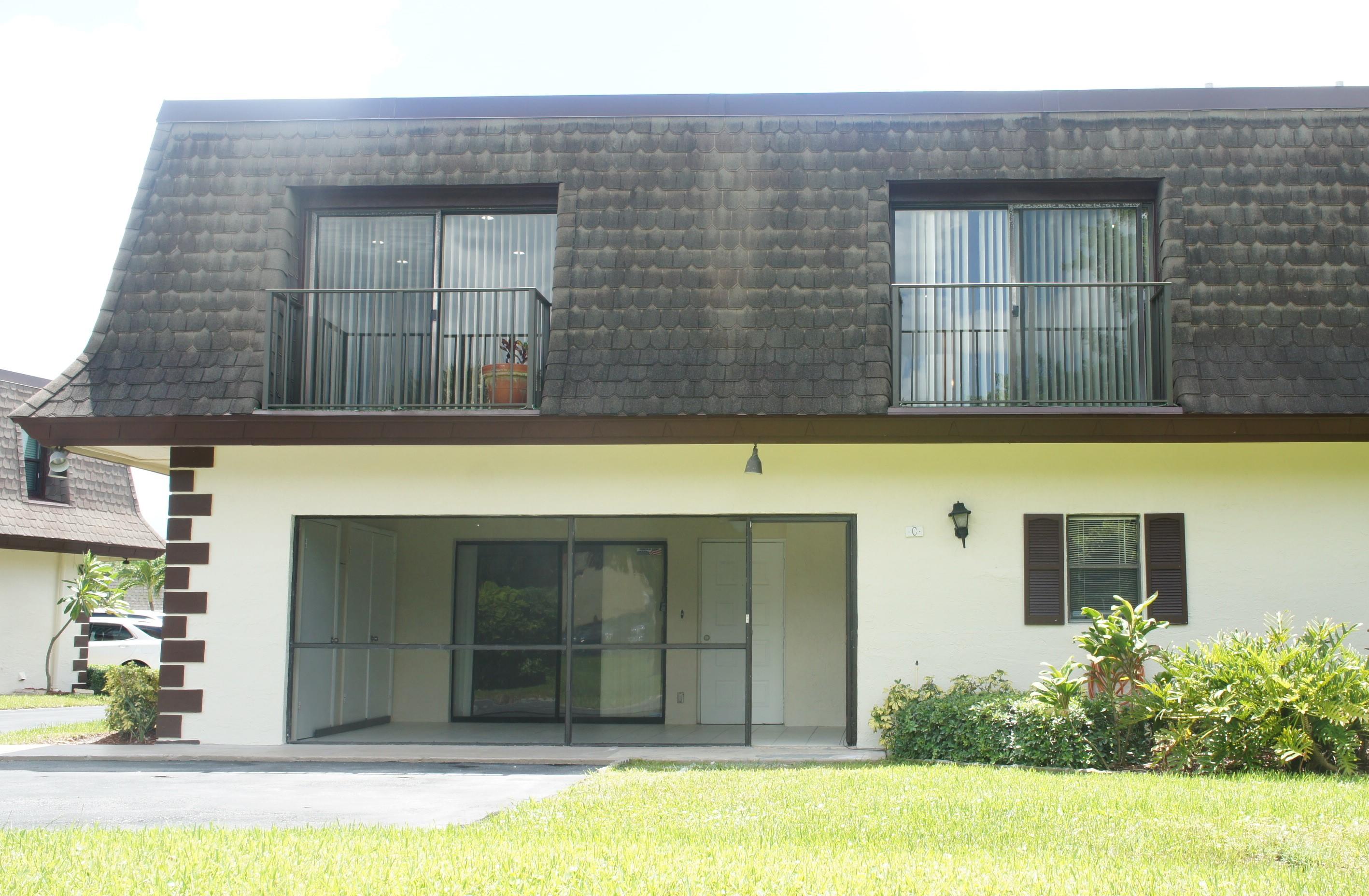 9450 Southwest 61st Way, Unit C Boca Raton, FL 33428 - Photo 1 of 25 Front Entrance and parking spots