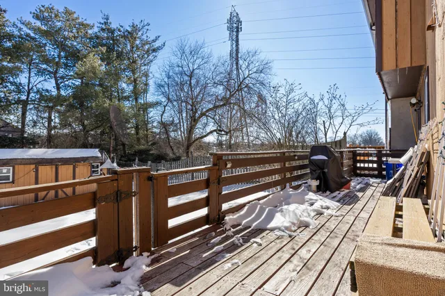 a view of balcony and deck with wooden floor