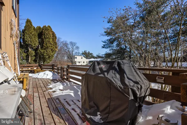 a view of balcony and deck with wooden floor