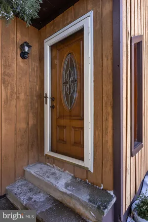 a view of a entryway door of a house