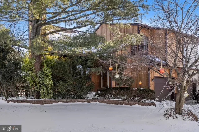 a view of a street with a building in the background