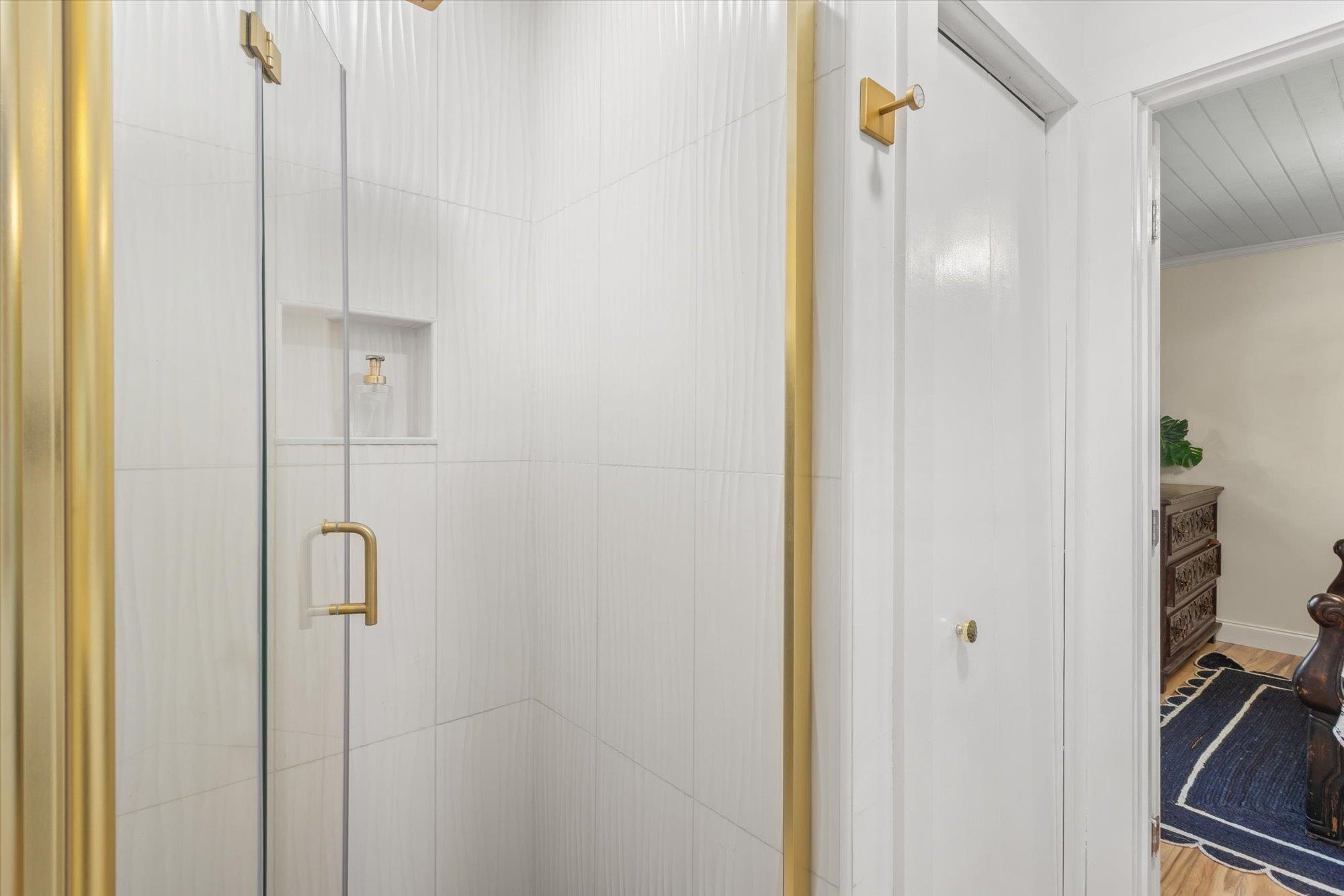 120 Swallow Road St. Augustine, FL 32086 - Photo 20 of 42 a bathroom with a shower and a glass door