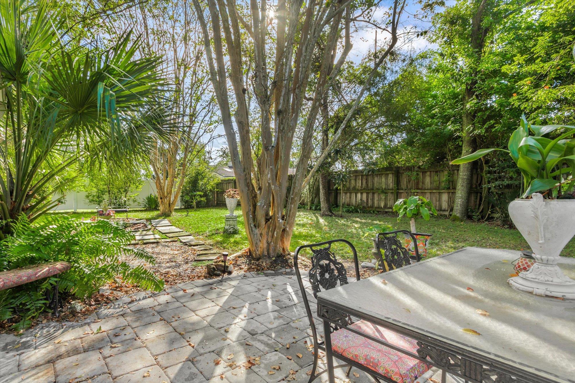 120 Swallow Road St. Augustine, FL 32086 - Photo 26 of 42 a view of backyard with sitting area