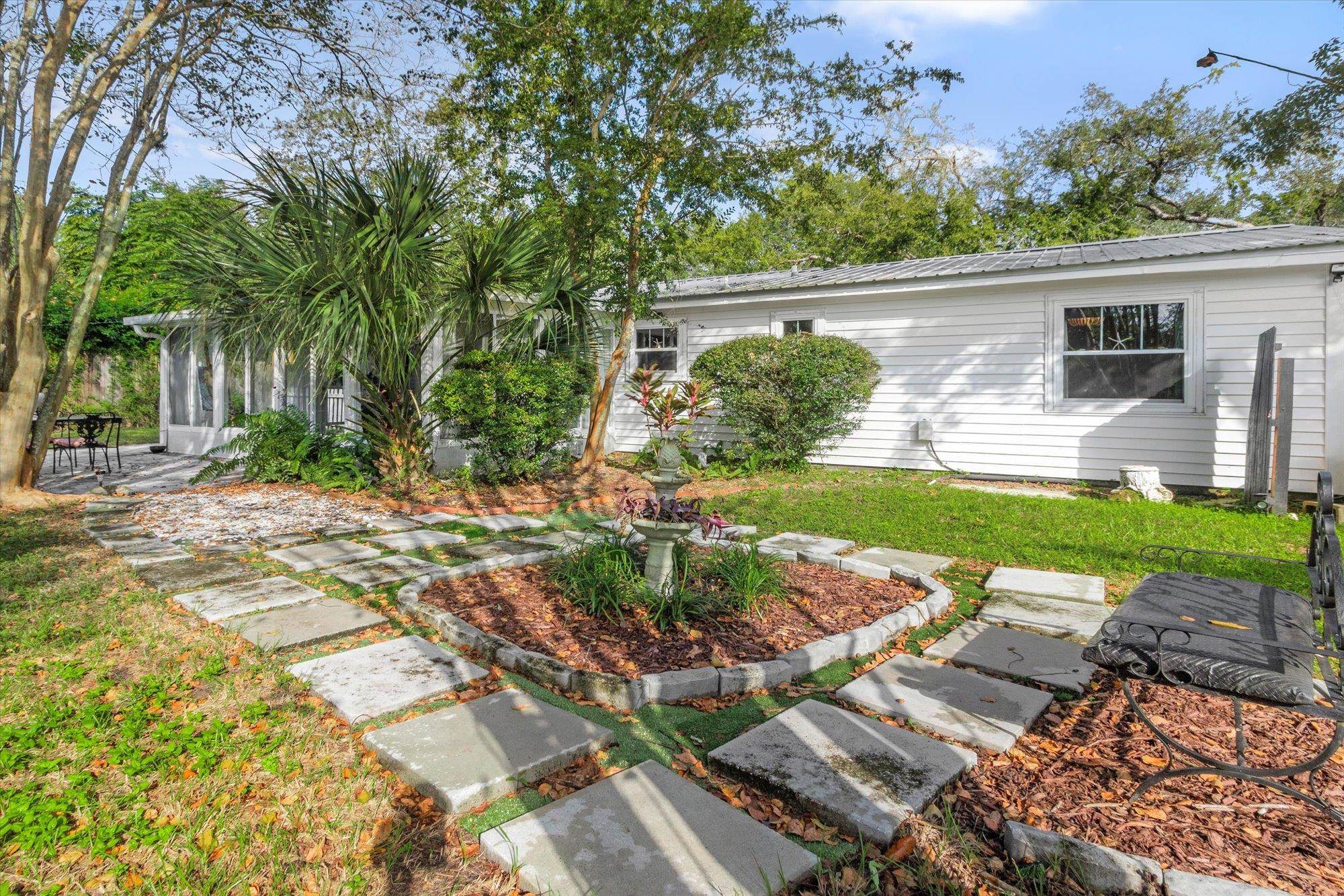 120 Swallow Road St. Augustine, FL 32086 - Photo 28 of 42 front view of a house with a yard