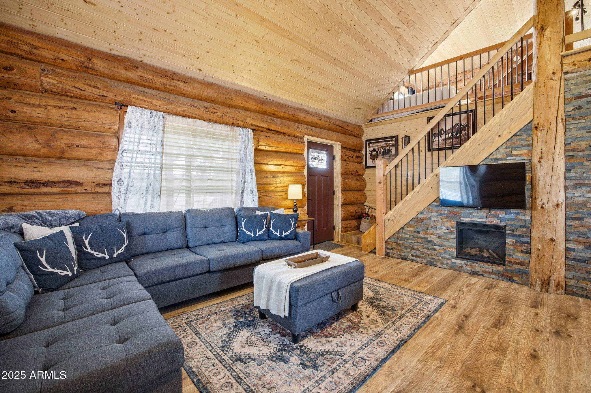 1904 Ponce Place Show Low, AZ 85901 - Photo 9 of 43 a living room with furniture and a fireplace