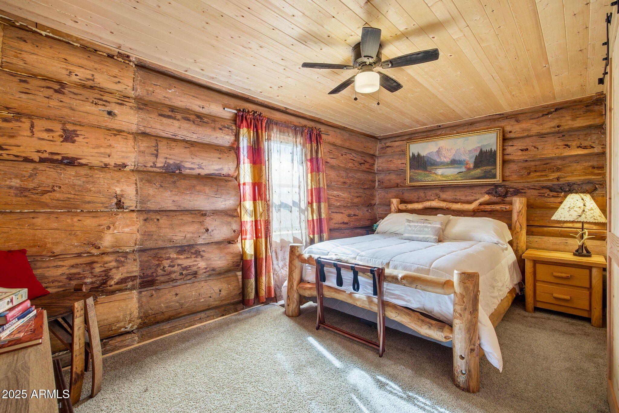 1904 Ponce Place Show Low, AZ 85901 - Photo 16 of 43 a bedroom with a bed and a ceiling fan
